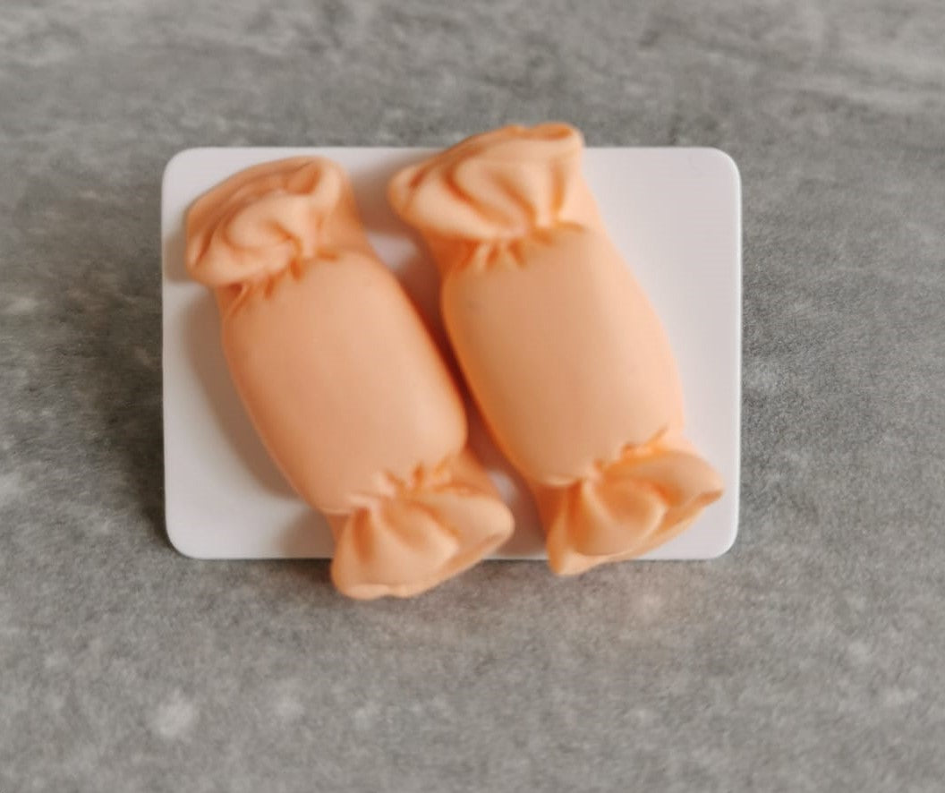 Orange candy wrapper